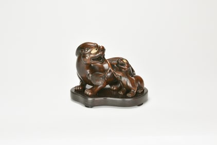 An Agarwood Carved ‘Two Beast’ With Stand, Qing Dynasty