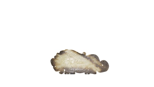 Spring and Autumn Period. A Finely Carved Russet and Celadon Jade Tigar