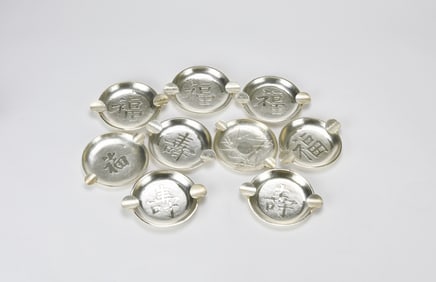 A Set of Eight Chinese Silver ‘Ruyi’ Form Small Dishes, Republic Period