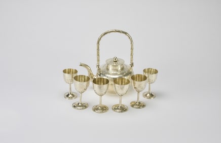 A Chinese Engraved Silver Teapot and Six Matching Goblets, Late Qing to Republic Period