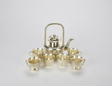 Chinese Silver Teapot and Cups with Floral Decoration (7 Pcs), Late Qing/ Republic