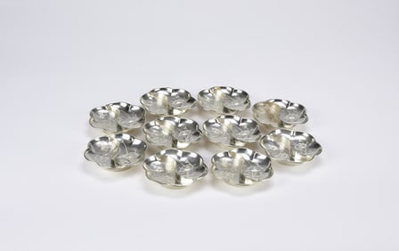Set of Ten Chinese Silver Dishes with Floral and Aquatic Engraving, Late Qing to Early Republic