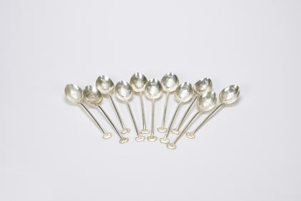 Set of Eleven Chinese Export Silver Teaspoons with Engraved Scenes, Late Qing to Early Republic