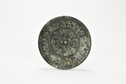A Bronze Mirror with Ocean Beasts and Grape PatternChina, Tang Dynasty (618–907 CE).