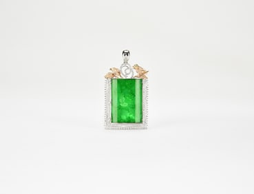 Fine Imperial Green Jadeite Rectangular Pendant with Diamond and Gold Bird Motif Mount.