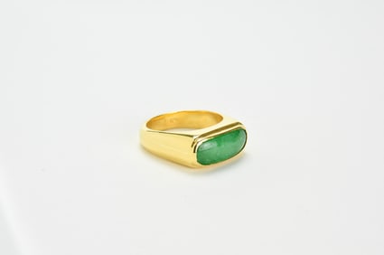 A 18k Gold Ring Mounted With Green Jadeite.