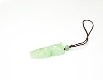 A Semi-Translucent Jadeite Carved Cicada Pendant