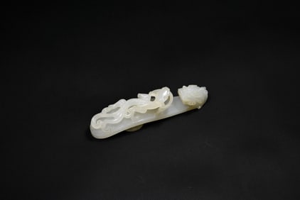 A Superb White Jade Belt Hook with Chilong and Taiji Symbol, Qianlong Period, (Mid-18th Century)