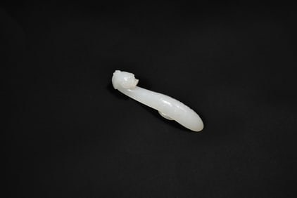 A Graceful White Jade ‘Dragon’ Ruyi Belt Hook, Qing Dynasty, 18th–19th Century