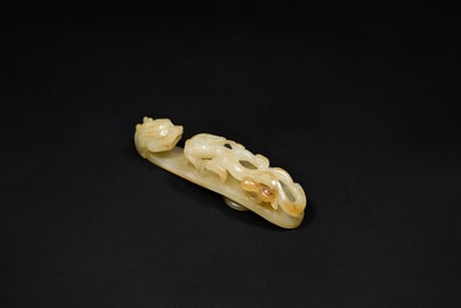 A Yellowish White Jade ‘Chilong’ Belt Hook, Qing Dynasty, 18th Century