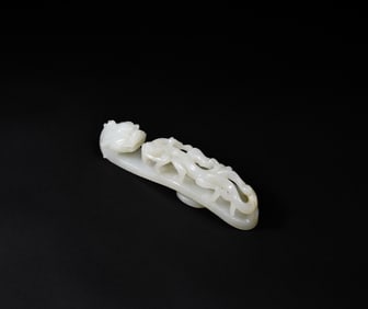 A Fine White Jade Belt Hook with Chilong DesignQing Dynasty, 18th–19th Century