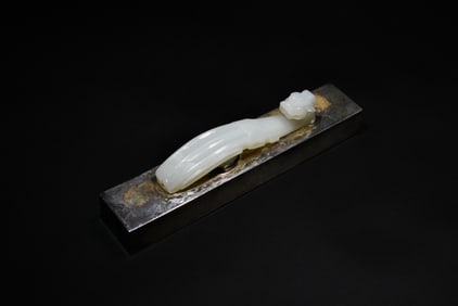 A Finely Carved White Jade Belt Hook with Dragon Head and Taotie Design, Qianlong Period