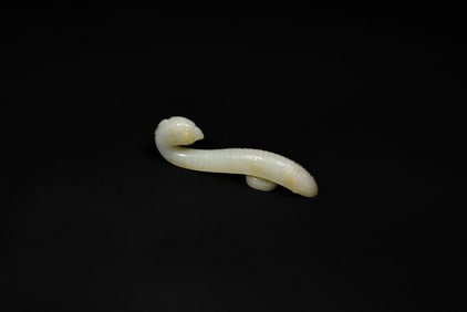 A Fine White and Yellow Jade Belt Hook with Phoenix Head and Ruyi-Cloud Design, Qianlong Period