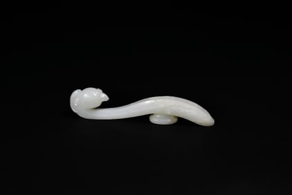 A Fine White Jade Belt Hook with Phoenix Head, Qianlong Period (1736–1795)