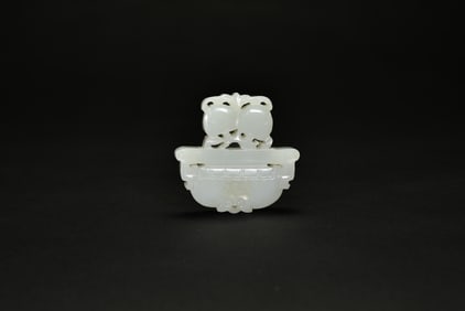 A White Jade Pendant Carved with Twin Fruits and an Archaistic Ding Form, Qing Dynasty (18th–19th