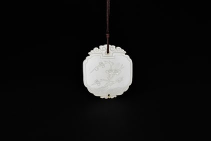 A White Jade Pendant Carved with Plum Blossoms and the Characters “Chang Shou,?? Qing Dynasty
