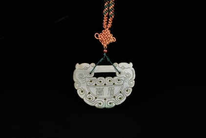 An Icy Jadeite ‘ Yi Jie Mei Shou’ with Chi Dragons Pendant, Late Qing to Republic Period (late