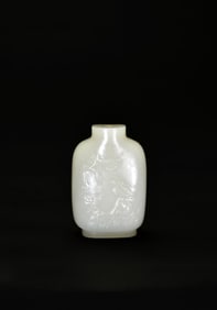 A Yellow-Russet and White Jade Snuff Bottle Carved with ‘Double Magpies and Plum Blossoms’ –