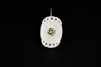 A White Jade ‘Spinning Center’ Openwork Pendant, Qing Dynasty (18th–19th Century)