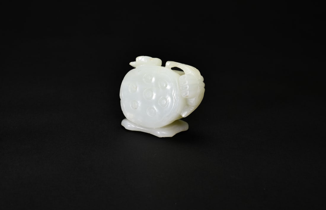 A White Jade Carving of Lotus Flower and PodQing Dynasty (18th–19th Century) (1 of 5)