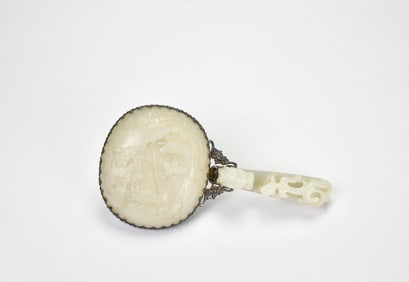 A White Jade Carved and Silver-Mounted Hand Mirror
