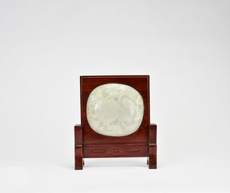 A White Jade Carved ‘Peach of Longevity’ Plaque on Table Screen, Qing Dynasty
