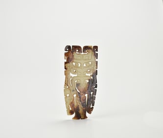 A Rare Celadon Jade Openwork Plaque Carved with a Mask Motif, Shang Dynasty (circa 13th–11th