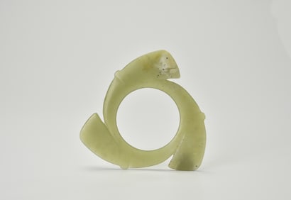 A Celadon Jade Archaic Disc (Xuanji) Hongshan Culture, Circa 3500–3000 Bce