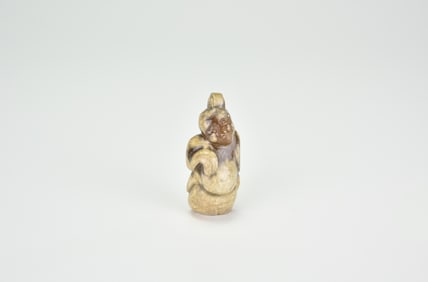 A Carved Celadon And Russet Jade Figure Of An Immortal (Bodhisattva Or Budai), Han Dynasty