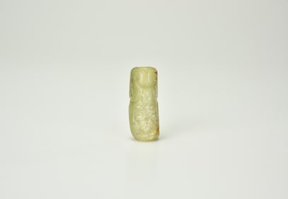 A Celadon And Russet Jade Cylindrical Bead (Cong-Form)Han Dynasty (206 Bce – 220 Ce)