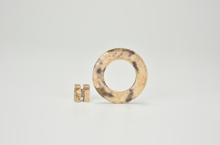 A Carved Jade Ring With Central Spindle Element, Han Dynasty (206 Bce – 220 Ce)