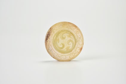 A Yellow Jade Bi Disc with Triple Whorl Design, Han Dynasty (circa 2nd Century BC – 1st Century