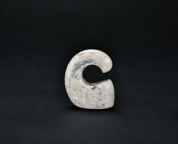 A Rare Archaic Jade Hook-Shaped Pendant, Neolithic Period, circa 3000–2000 BCE