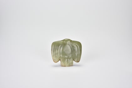 A Yellow Jade Owl-form Pendant, Hongshan Culture (circa 3500–3000 BC)