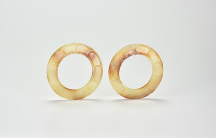 A Pair Of Fine Archaic Hetian Jade Ring (“ Yuan??), Shang Dynasty (c. 13th–11th century BCE)