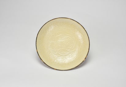 A Dingyao White-Glazed Mold-Impressed “Dragon and Clouds?? Dish, Song–Jin dynasty (12th–13th