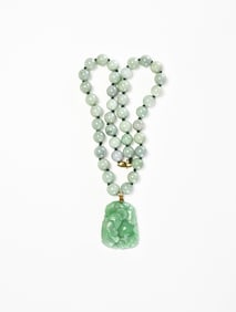 A Fine Jadeite Pendant Necklace “Abundance Year After Year??, 20th Century.