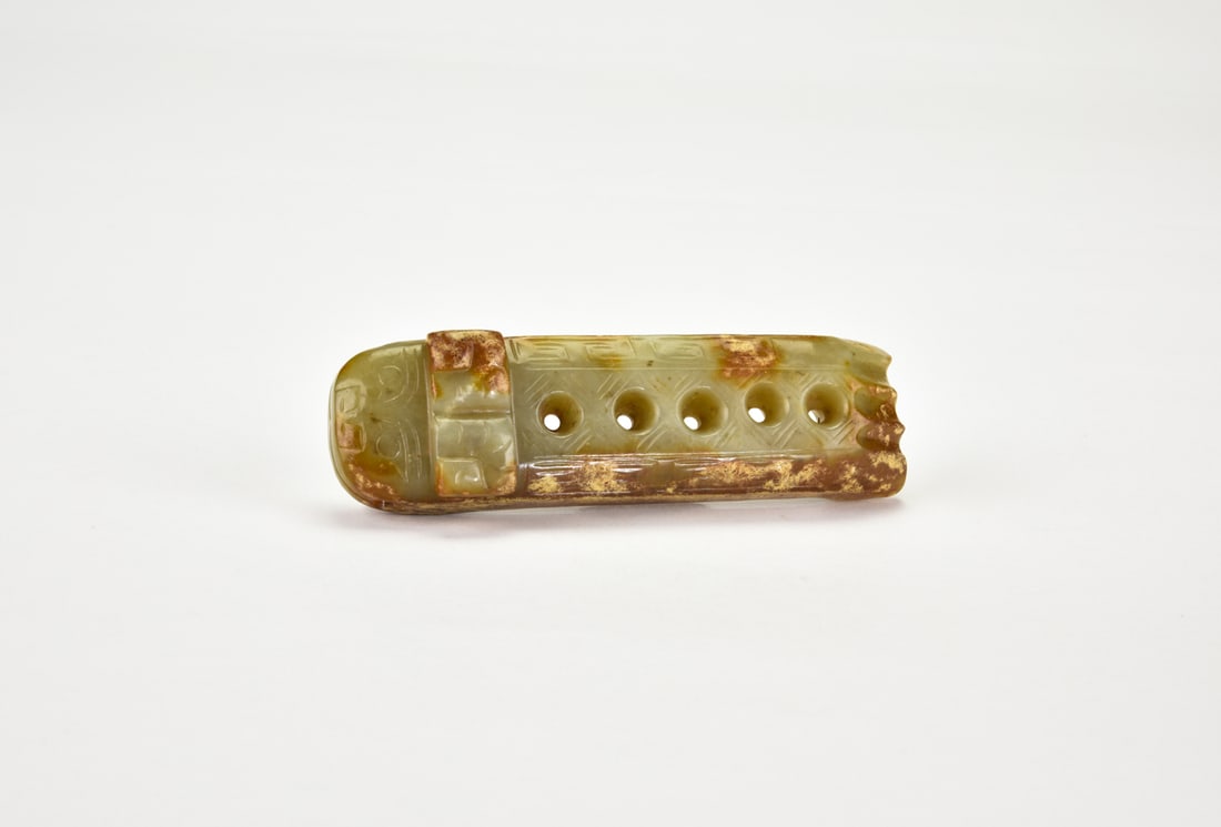 A Carved Celadon Jade ‘Tiger’ Ornament Warring States to Western Han period (1 of 6)