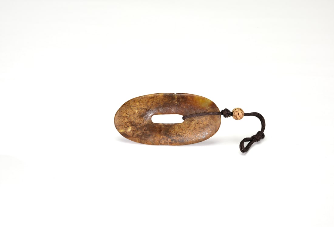 A Jade Sword Fitting. China, Han Dynasty (206 BC – AD 220). (1 of 5)