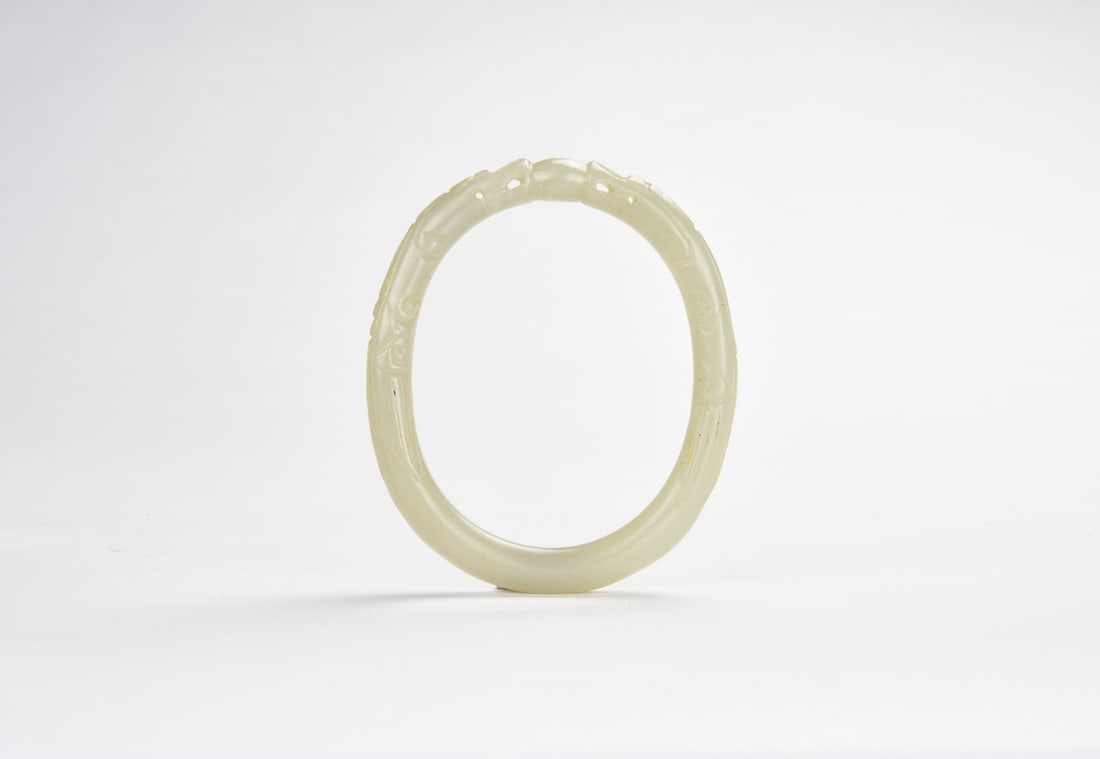A Celadon Jade ?Double Dragon Chasing Pearl? Bangle ?Qing Dynasty (1 of 8)