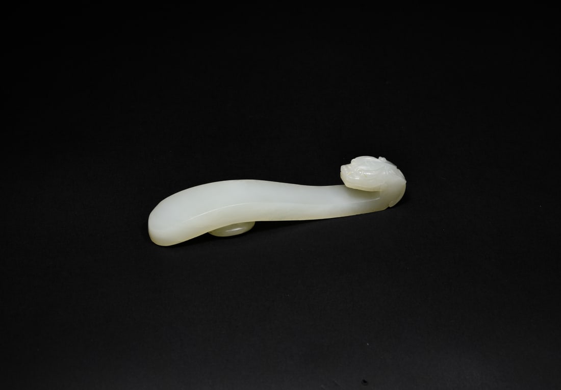 A Finely Carved White Jade Belt Hook with Dragon Head, Qianlong Period (1736?1795) (1 of 5)