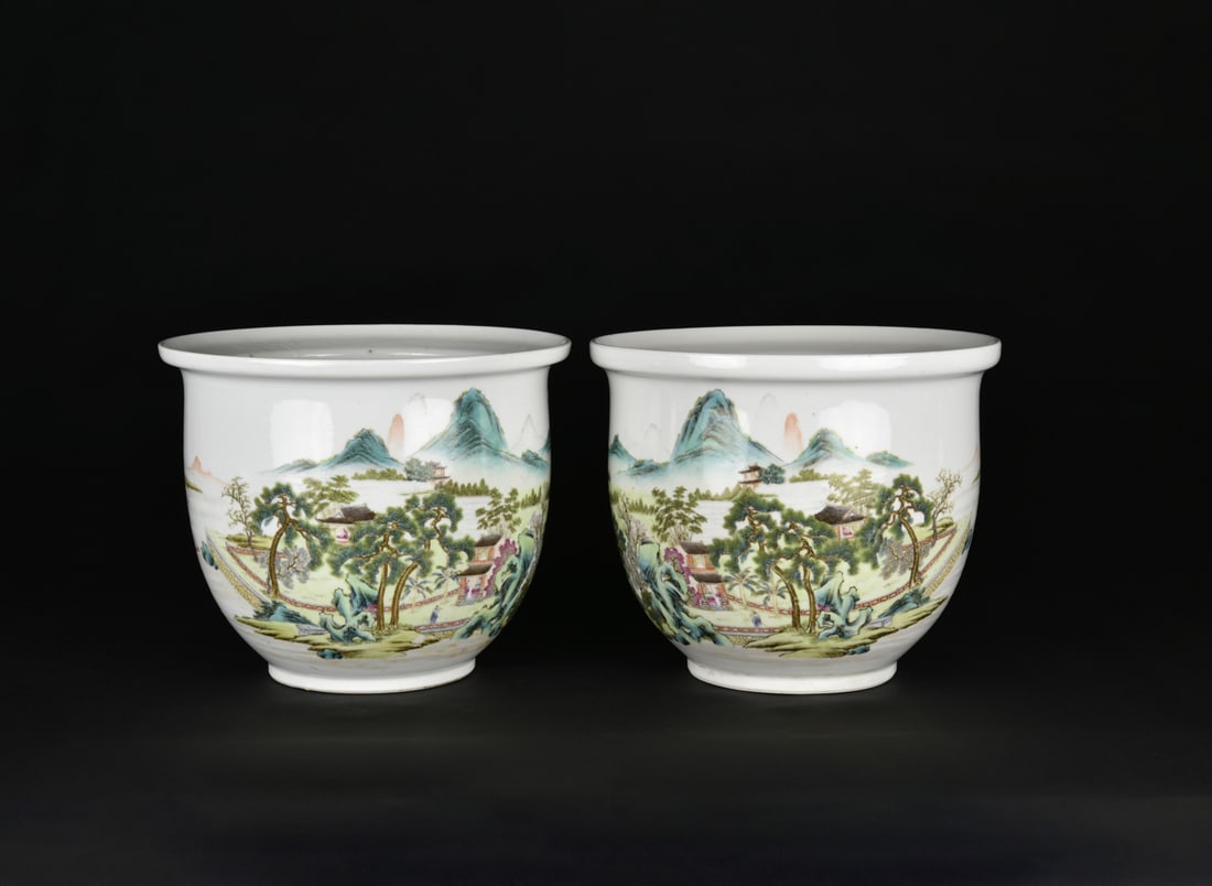 A Pair of Famille Rose Landscape Jardinires. Republic Period: circa 1935–1955, with Apocryphal Iron-Red “Hongxian Nianzhi” Marks Each jardinière is sturdily potted with a gently flared rim and rounded body, finely painted in famille rose e