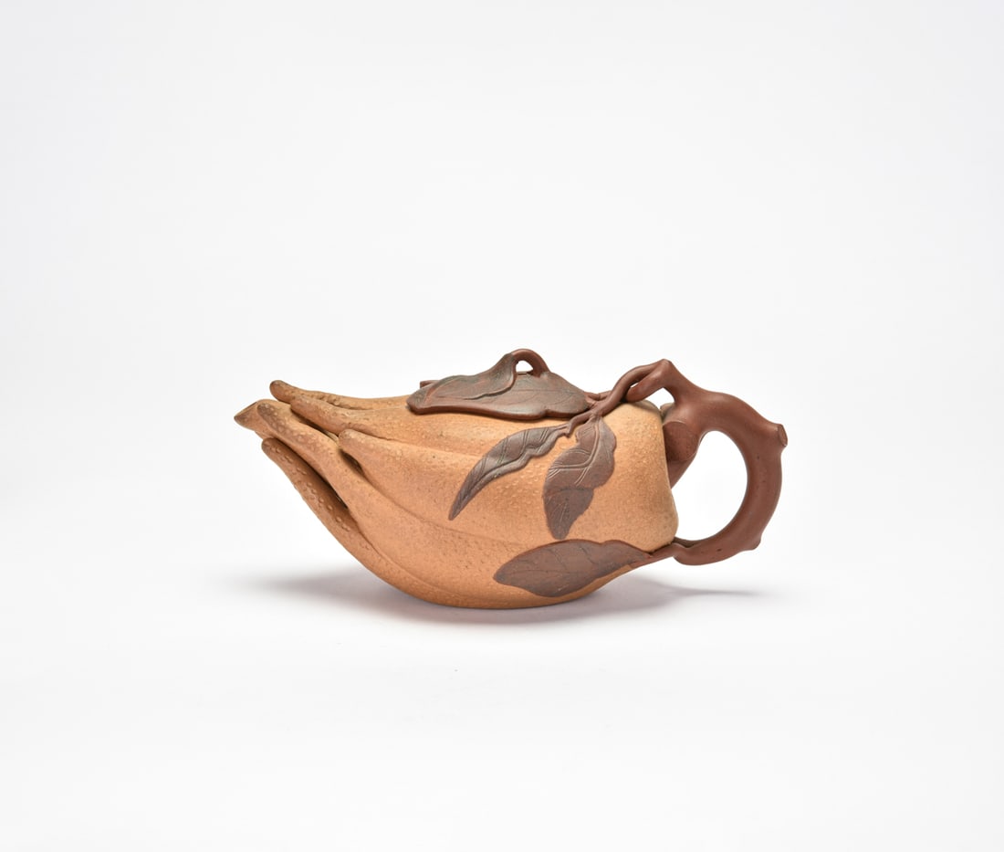 A Group of Cloisonne Enamel and Silver-Mounted Articles: Signed Dasheng Modeled as a fingered citron with intertwined branches and leafy vines, the vessel features a textured surface simulating the fruit rind. The cover formed as overlapping leaves, the