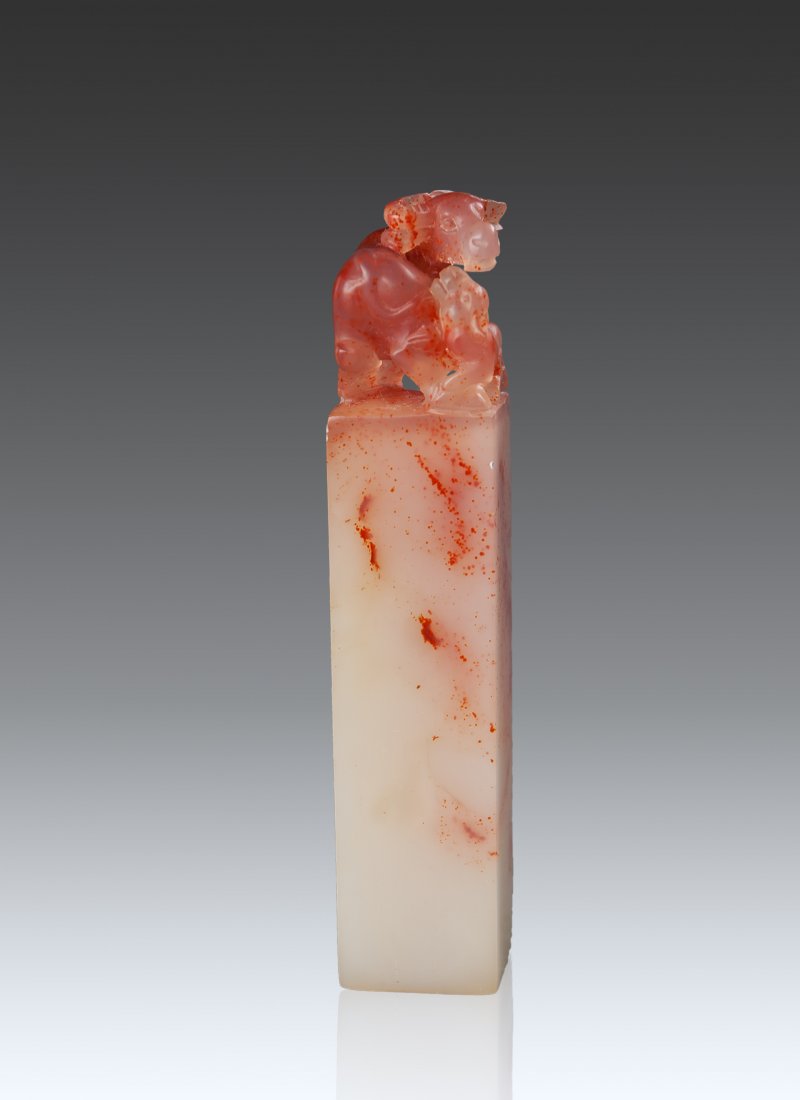 A Soapstone (Peach) Seal: A Soapstone (Peach) Seal 1.8 x 1.8 x 9 cm. (11/16 x11/16 x 3 1/2 in.) 壽山桃花凍，雙牛鈕方章