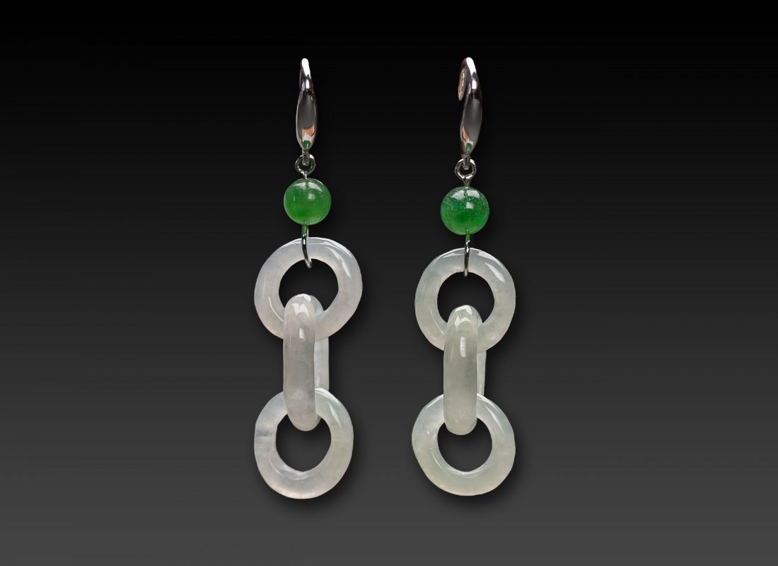 Natural Jadeite Jade 18K white gold earrings: Natural Jadeite Jade 18K white gold earrings Certified type A carved icy white jadeite in chain style, accented by a green bead. Accompanied by a certificate (Guarantee Grade A jadeite or money back w
