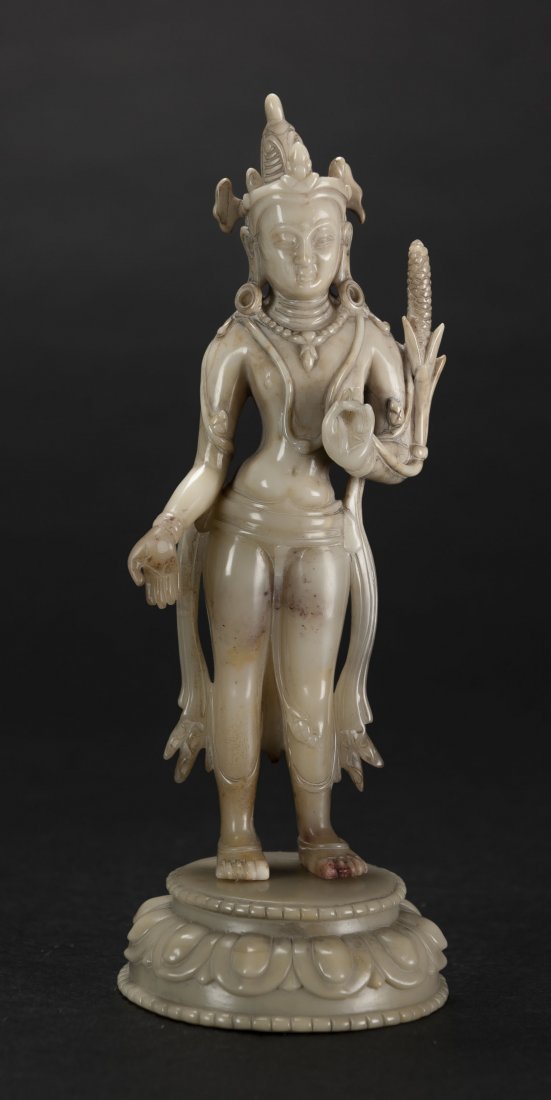 A soapstone Buddha statue: A soapstone Buddha statue H:19 cm. (7 1/2 in.) 壽山石雕菩薩像