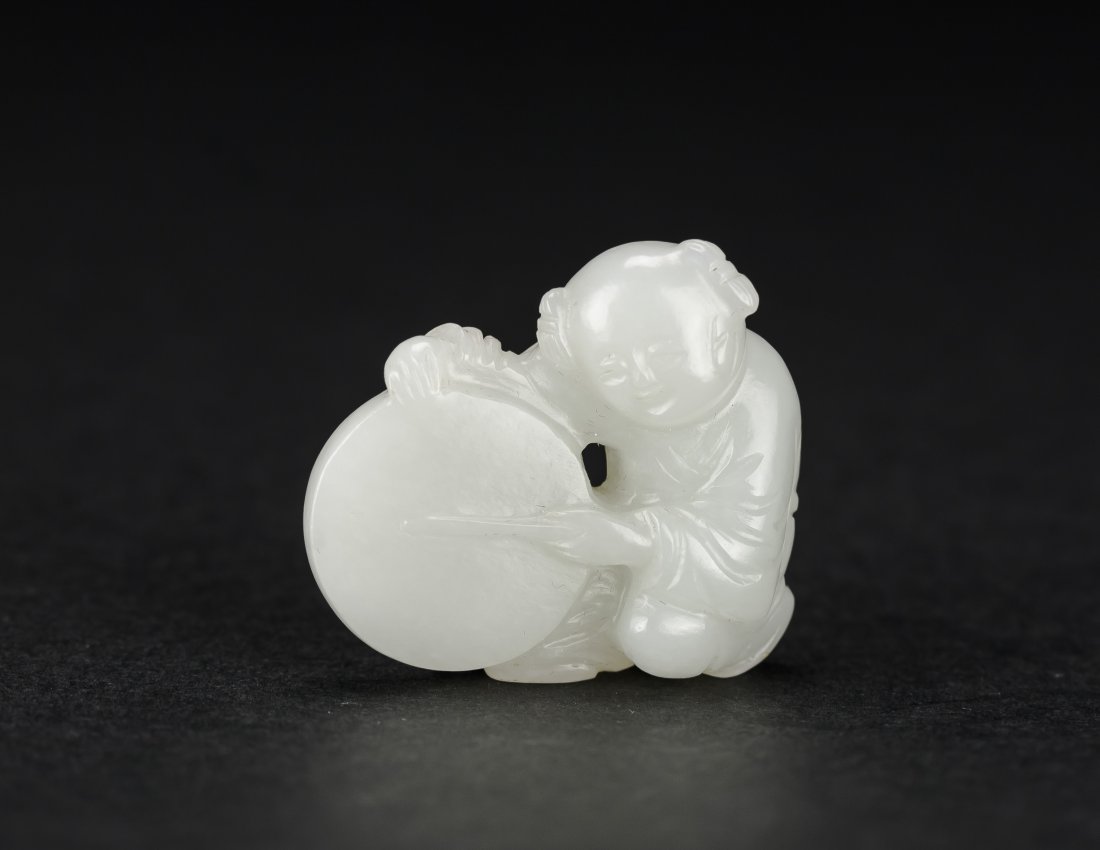 Ming-A White Jade Carved Boy Plays Drum: Ming-A White Jade Carved Boy Plays Drum 4.2 cm. 明 白玉童子敲鑼 Provenance來源：美國藏家所提供
