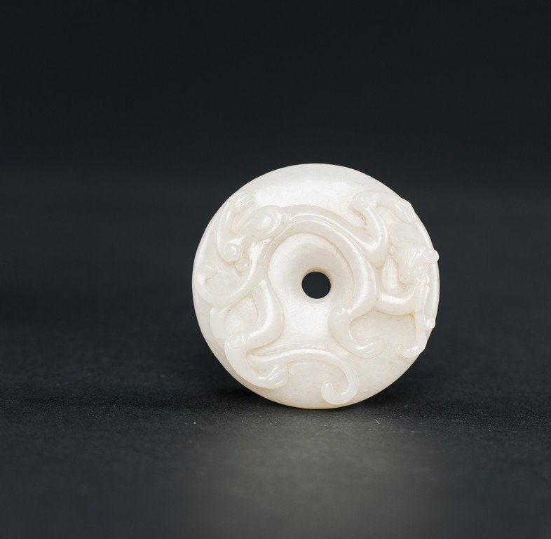 Qing - A WHITE JADE CARVED ‘Chi Dragon’ Pendant (1 of 4)