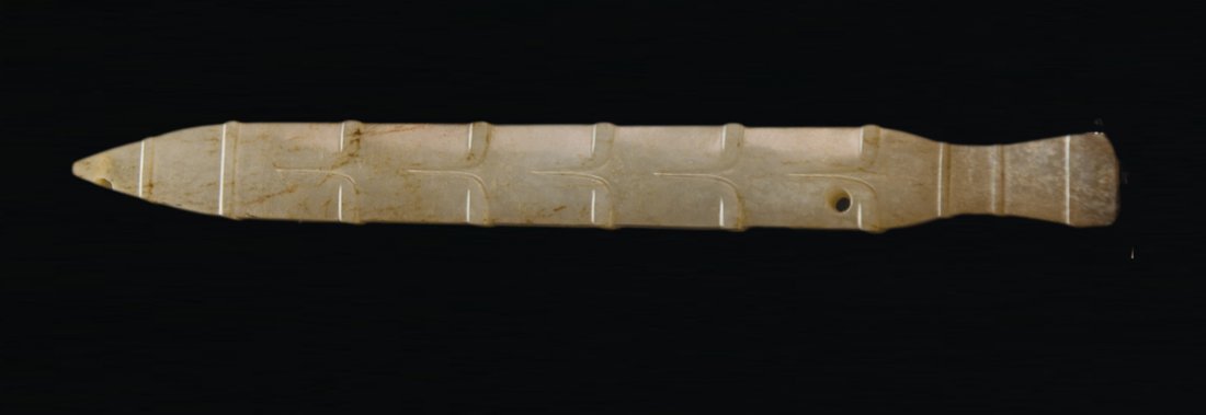 Shang-A Jade Carved Hilt: Shang A Jade Carved Hilt 13.6 x 1.4 x 1 cm. 商 樵葉紋柄型器