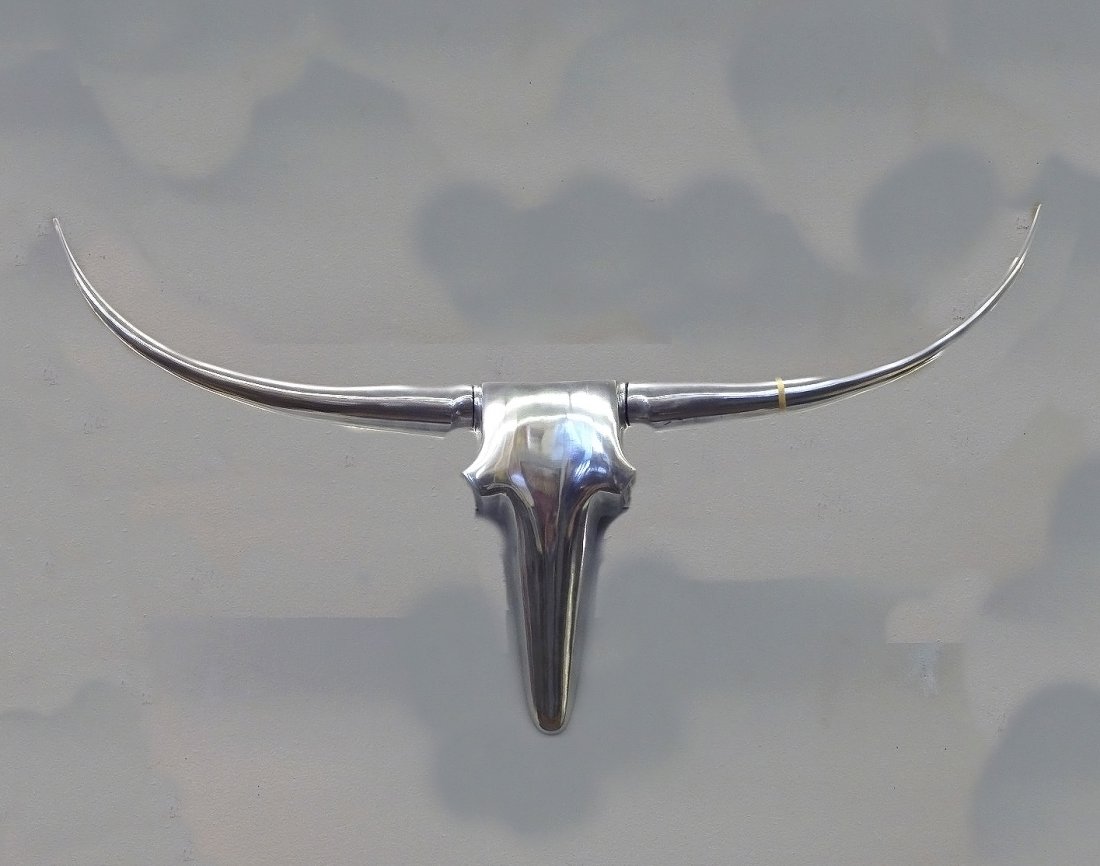 Minimalist Metal Wall Sculpture, “The Pride of Texas.”: Minimalist Metal Wall Sculpture, “The Pride of Texas.” In the form of a Longhorn. 28” x 40”